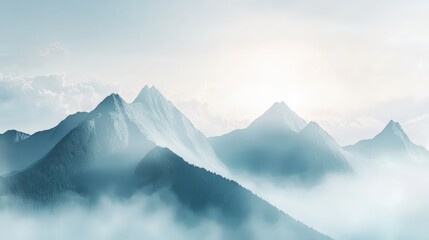 Obraz premium A serene mountain landscape at sunrise, with mist rolling over the peaks