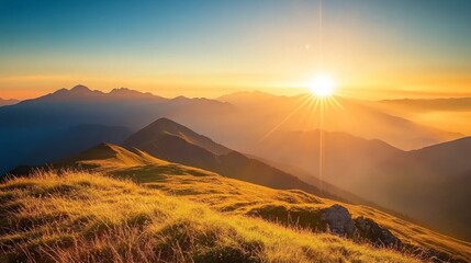 Obraz premium Golden Sunset Over Mountain Peaks