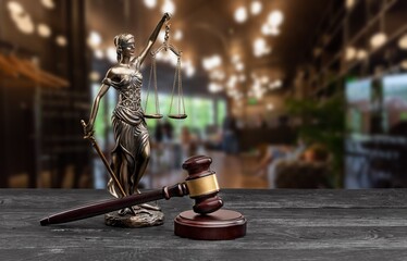 Symbol  law and justice, wooden gavel on the desk