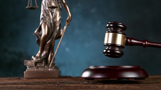 Super slow motion of gavel being struck to decide an auction or guilty verdict in court . Filmed on high speed cinematic camera at 1000 fps