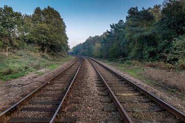 Fototapeta premium Railway tracks leading into the distance