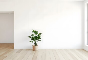 A potted green plant with large, lush leaves against a white brick wall background