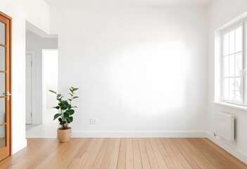 Fototapeta premium A potted palm plant in a minimalist interior setting with a plain white wall and wooden floor