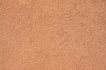 texture of plastered wall in orange color