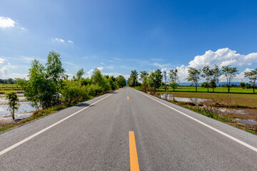 Fototapeta premium Nature Wallpaper (Mountains, Green Fields, Roadside Accommodation, Twilight Sky) The beauty of nature while traveling, with the wind blowing through the blurred leaves.