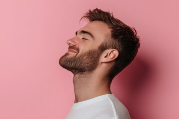 Obraz premium A close up of a man's face with his eyes closed