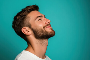 Obraz premium A close up of a man's face with his eyes closed