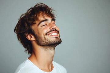 Obraz premium A close up of a man's face with his eyes closed