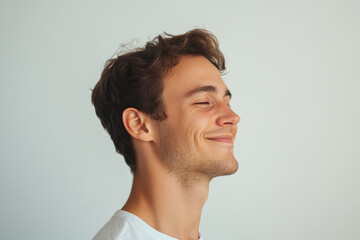 Fototapeta premium A close up of a man's face with his eyes closed