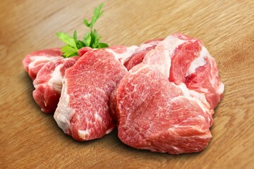 Fresh tasty raw meat pieces on the desk