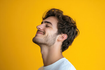 Obraz premium A close up of a man's face with his eyes closed