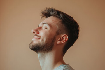 Obraz premium A close up of a man's face with his eyes closed