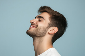 Obraz premium A close up of a man's face with his eyes closed
