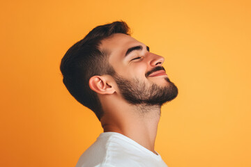 Obraz premium A close up of a man's face with his eyes closed