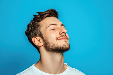 Fototapeta premium A close up of a man's face with his eyes closed