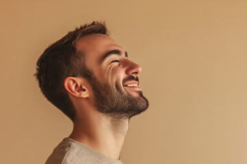 Obraz premium A close up of a man's face with his eyes closed