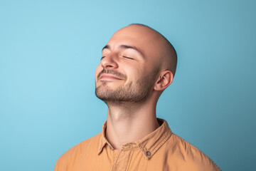 Obraz premium A close up of a man's face with his eyes closed
