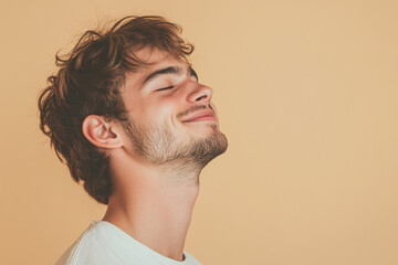 Obraz premium A close up of a man's face with his eyes closed