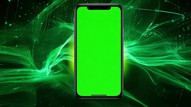 Smartphone with chroma key green screen against alien green swirling background.