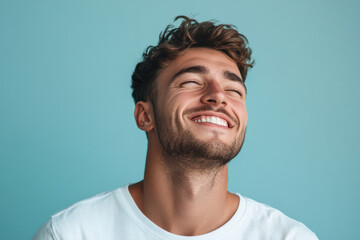 A close up of a man's face with his eyes closed