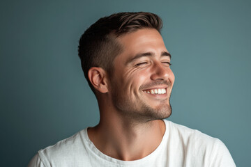 A close up of a man's face with his eyes closed