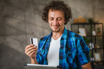 adult man have online shopping on digital tablet with credit card