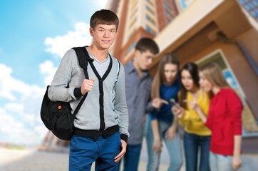 Obraz premium Young university student standing in college campus