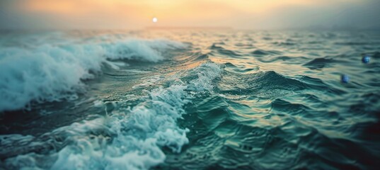 Fototapeta premium Tranquil Ocean Waves at Sunset A breathtaking seascape bathed in the warm glow of the setting sun.