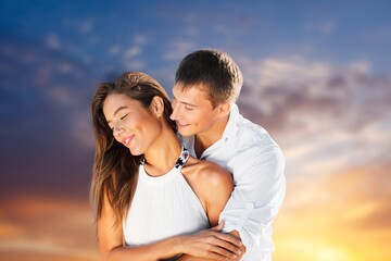 Fototapeta premium Happy young lovely couple at beach vacation