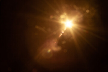 Sun flare on the black background