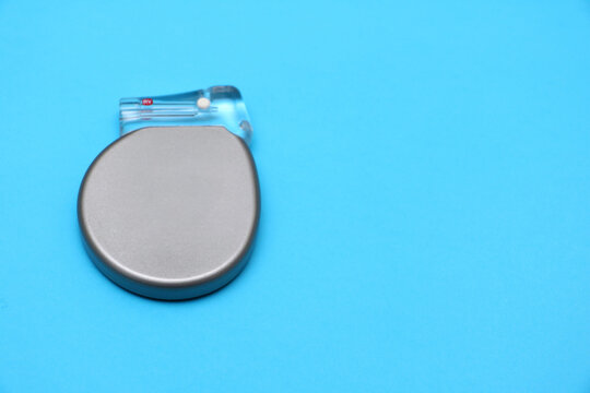 High angle view of a mini implantable cardioverter defibrillator (ICD) device .