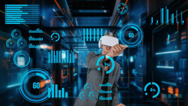 Businesswoman explaining dynamic market data calculated analysis in big data business by VR innovation interface digital infographic network technology visual hologram animation server. Contraption.