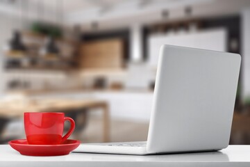 Open laptop with empty blank screen at home office