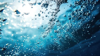 Realistic photography of sun rays shining through the water, hitting the seabed. Underwater bubbles are visible, enhancing the natural light and serene underwater environment.

