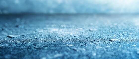  A tight shot of a wet surface dotted with water drops Blue sky backdrop