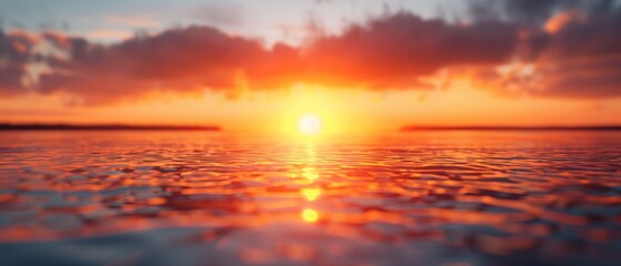 Obraz premium sun sinking behind clouds, reflected glow on surface