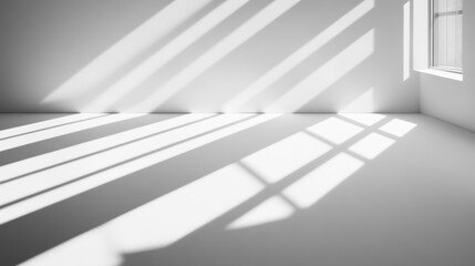 Obraz premium A minimalist interior with shadows cast by a window.