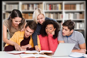 Group of students study materials in school library