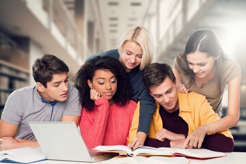 Group of students study materials in school library