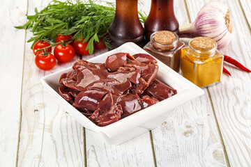 Raw chicken liver uncooked in the bowl