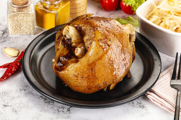 Baked pork knee with spices