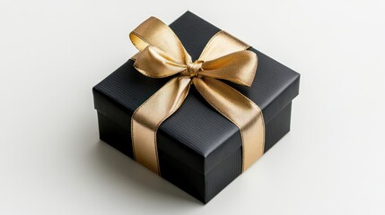 Obraz premium Elegant black gift box with a shiny gold ribbon, perfect for special occasions.