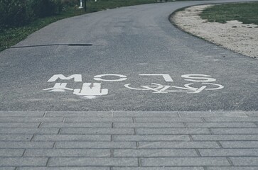 Curved Pathway with pedestrian Sign and Bicycle Symbol