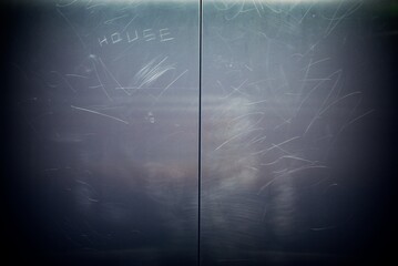Scratched Metal Elevator Door