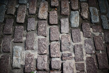 Close-Up of Weathered Cobblestone Pavement