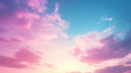 Obraz premium A serene sky at dawn with soft pink and blue hues, evoking tranquility and beauty.