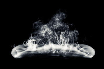 Real smoke exploding outwards. Dramatic smoke or fog effect for spooky Halloween magic.