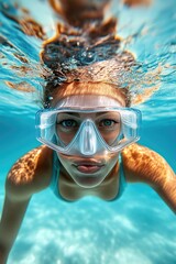 Fototapeta premium Portrait of a Woman in Diving Suit and Gear Swimming Underwater in Open Ocean
