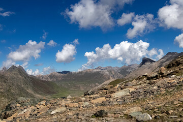 Beautiful mountain scenery. River, valley, snow, blue sky, white clouds. In-depth trip on the Sonamarg Hill Trek in Jammu and Kashmir, India