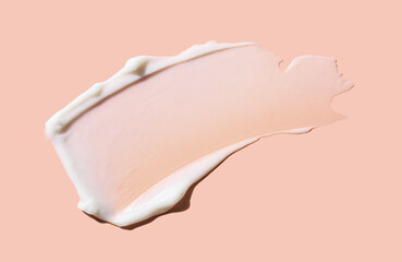 Face or body white cream hair balm peach cream pink peach coral background